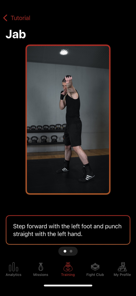 StrikeSensai - Pantalla de tutorial en la aplicación StrikeSensai que demuestra un jab de boxeo con guía visual e instrucciones paso a paso