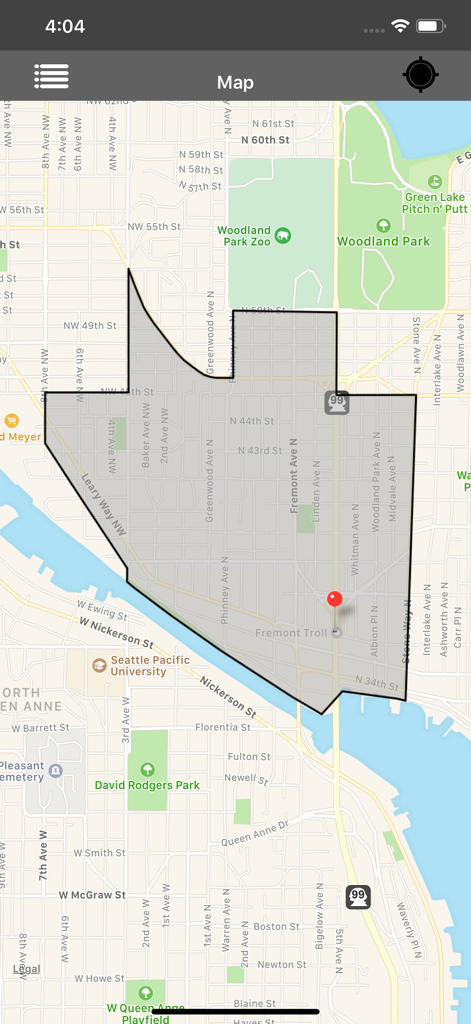 Interface cartographique affichant une superposition de polygone gris et une épingle de localisation rouge dans l'application de visualisation KML et KMZ.