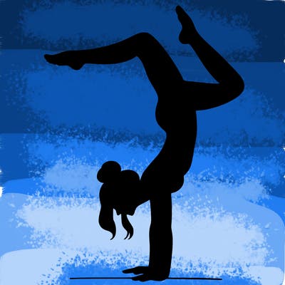 a woman doing a handstand