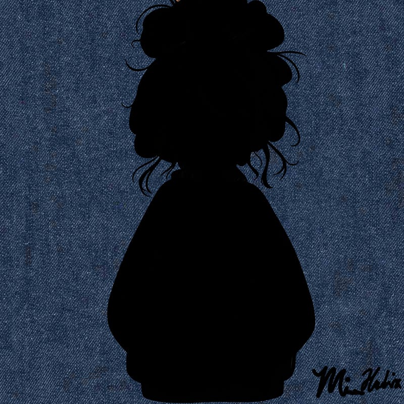 girl with baggy sweatshirt and messy bun