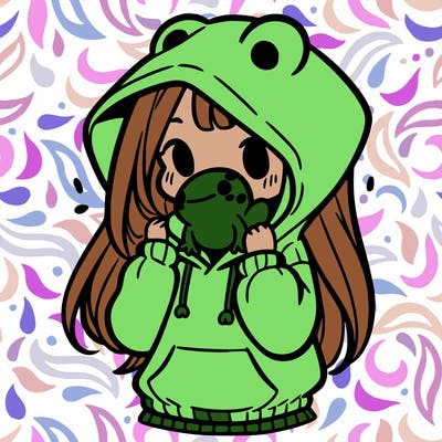 a girl holding a froggy hoodie