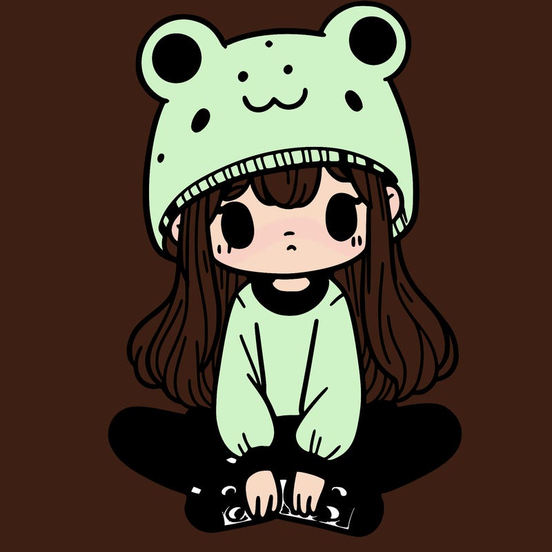a girl wearing a frog hat and some frog socks