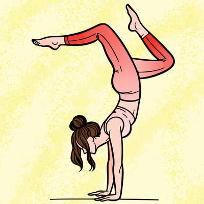 a woman doing a handstand