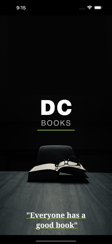 DC Books reader app splash screen with logo and an open book with glasses on a dark table
