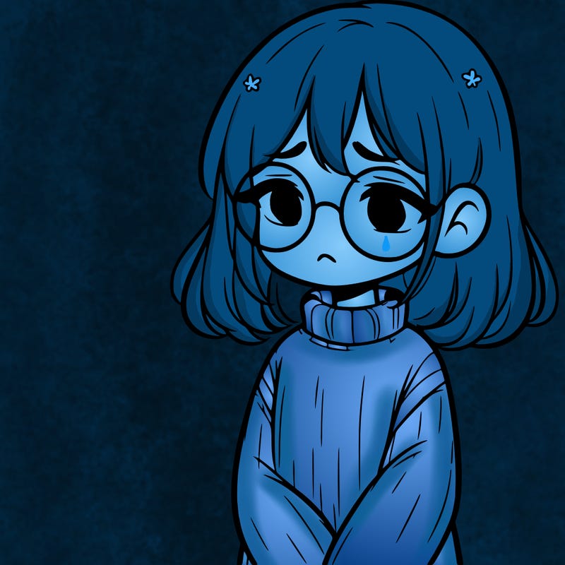 sad girl with glasses in a sweater