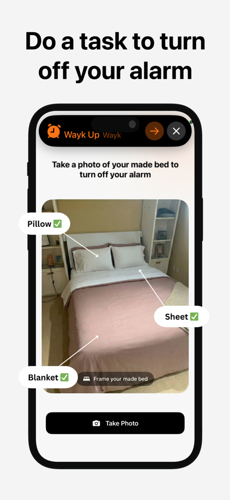 Wayk: Wake Up Early - 사용자가 알람을 끄기 위해 정리된 침대 사진을 찍어야 하는 미션을 보여주는 Wayk 앱 인터페이스.