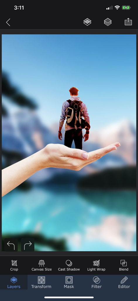 Superimpose X app interface showing a surreal photo composite with a miniature person standing on a hand using layers.