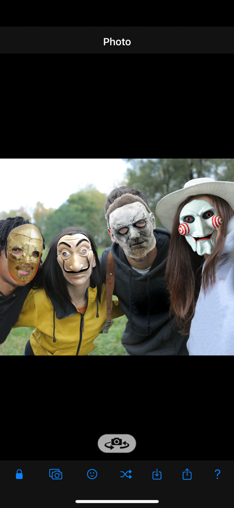 AR Mask - Four people wearing different digital masks including horror and pop culture characters in the AR Mask app