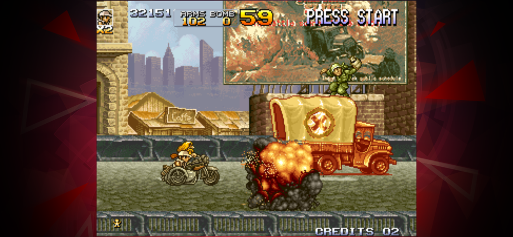 METAL SLUG 4 ACA NEOGEO - Action gameplay in Metal Slug 4 featuring a character on a motorcycle next to an explosion and an enemy truck