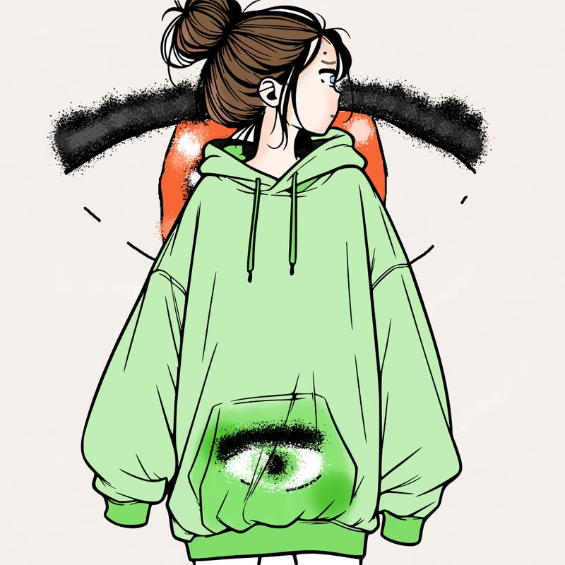 realistic girl with a oversized sweatshirt on and a bun
