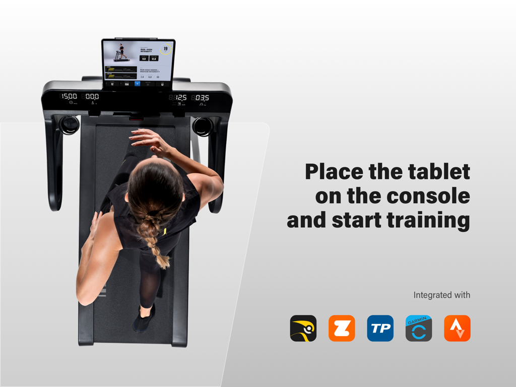 Technogym Live - A woman running on a Technogym treadmill with an iPad displaying the Live app and integration icons for Strava and Garmin.