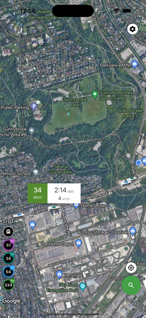Real-time satellite map view showing live bus locations and speed data in the app.