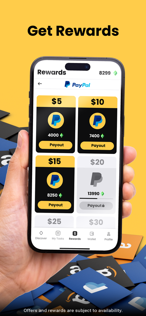 Hand holding an iPhone showing the rewards screen of the Cash Giraffe app with various PayPal payout options.