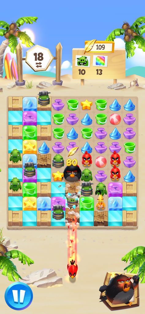 Angry Birds Match 3 gameplay screenshot showing a colorful puzzle board with beach themed items and bird power ups on a tropical island background