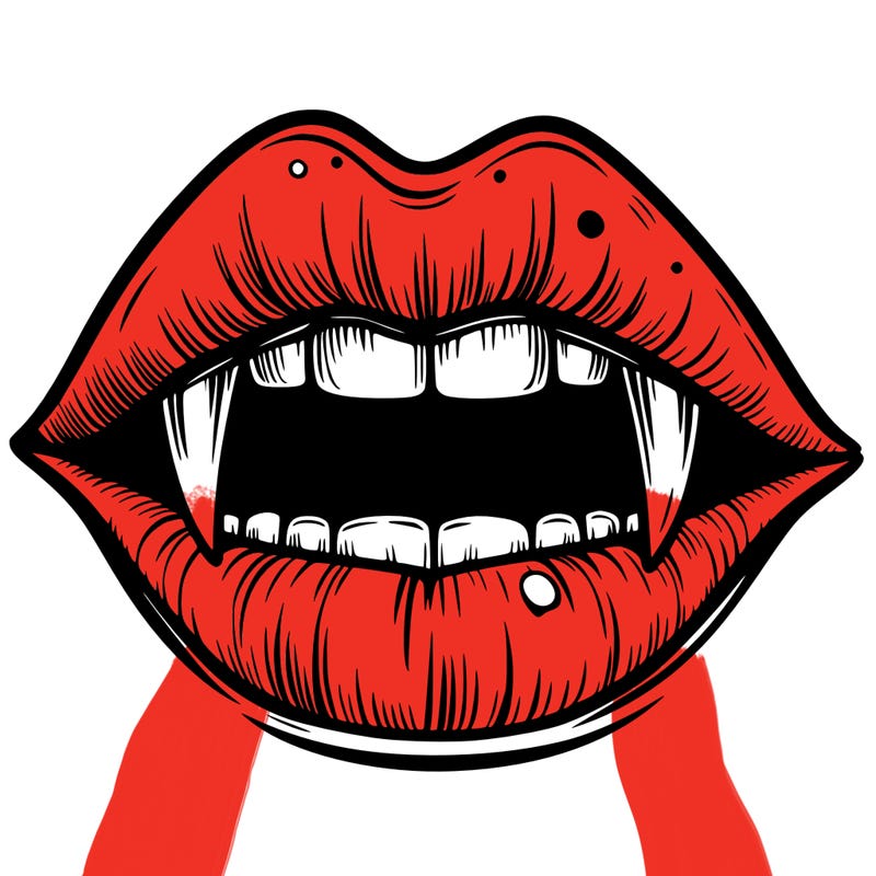 lips with vampire teeth