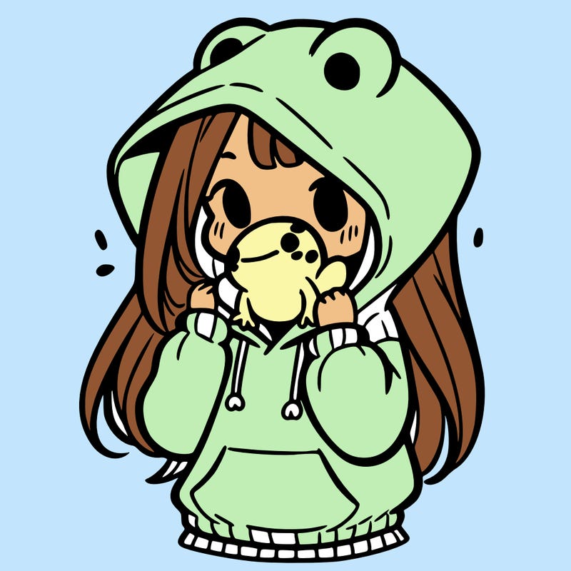 a girl holding a froggy hoodie