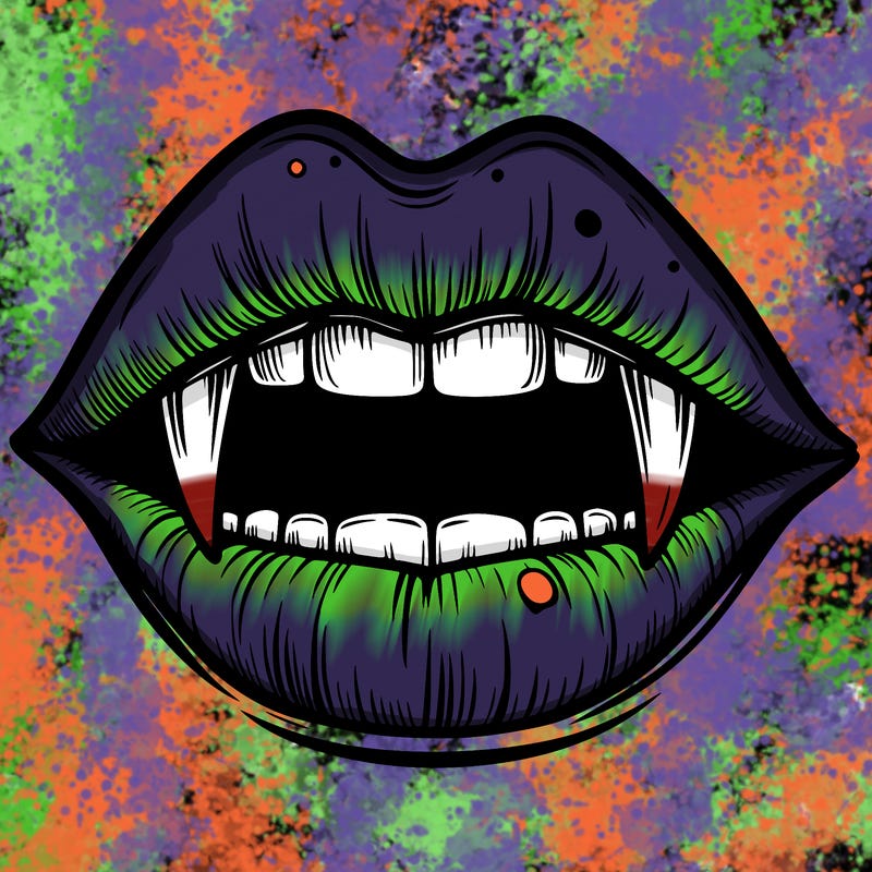 lips with vampire teeth