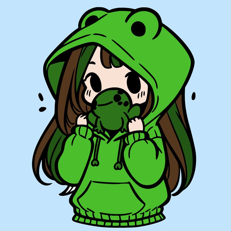 a girl holding a froggy hoodie