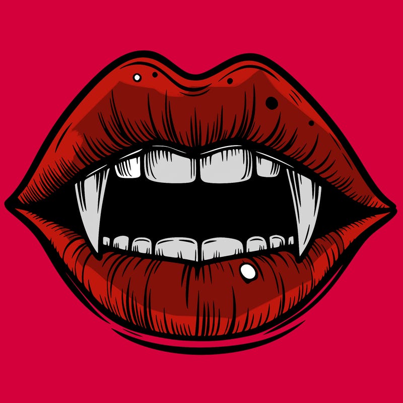 lips with vampire teeth