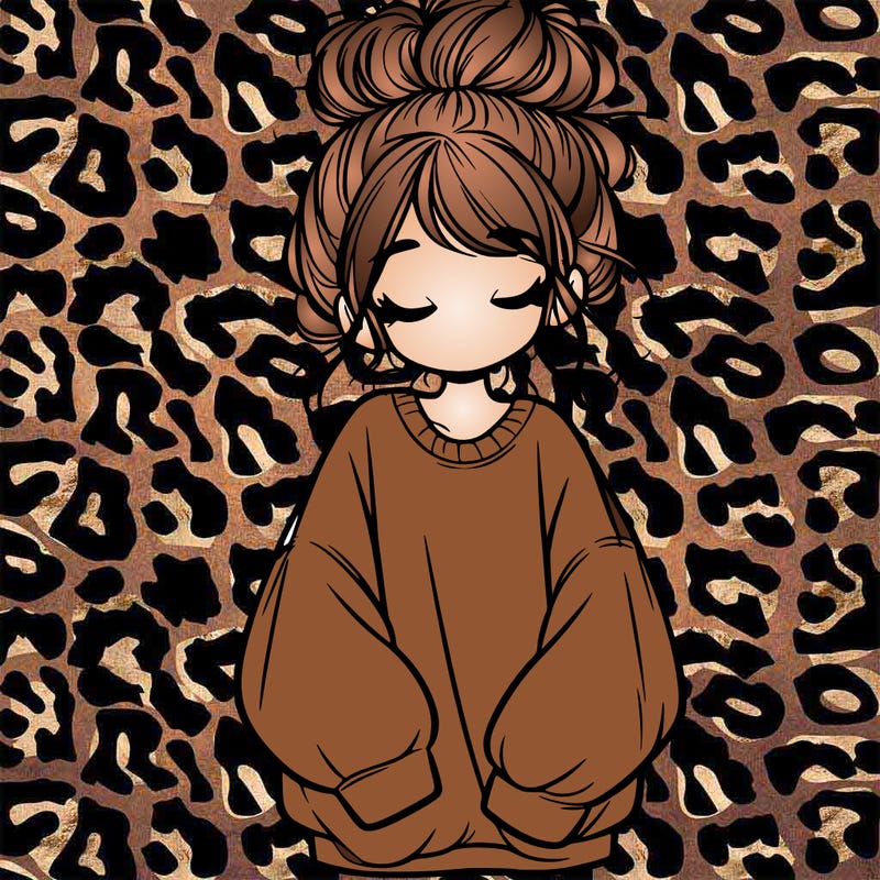 girl with baggy sweatshirt and messy bun