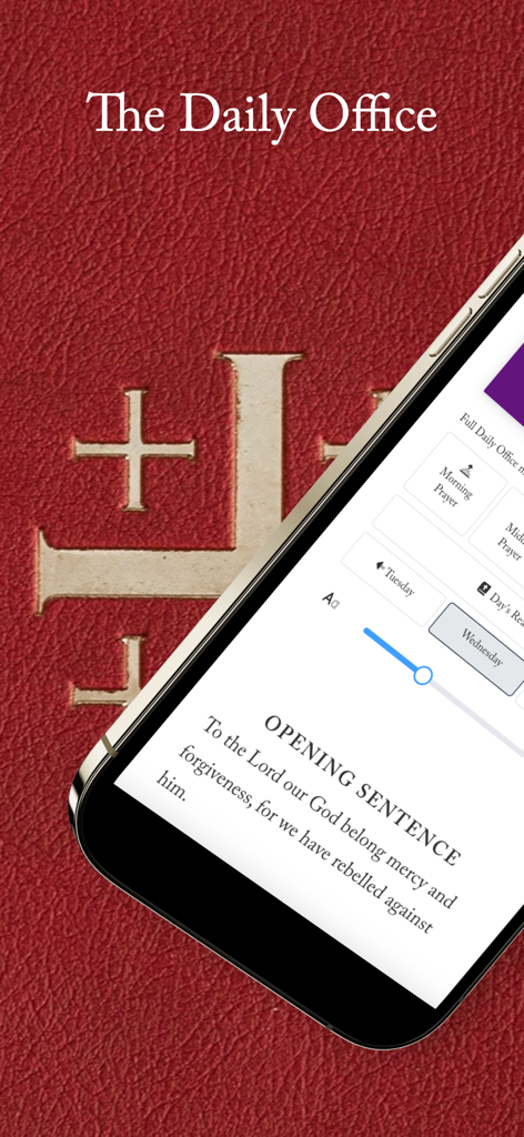 The Daily Office app displaying a prayer screen on a smartphone over a red leather background