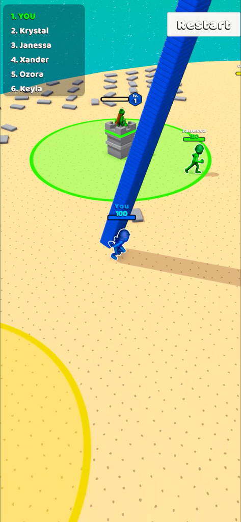 Outdo.io - A blue character carrying a very tall stack of blue bricks across a desert arena in the Outdo.io game.