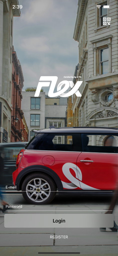 FLEX Carsharing - 都市の通りに駐車された赤いミニクーパーを特徴とするFLEXカーシェアリングアプリのログイン画面。