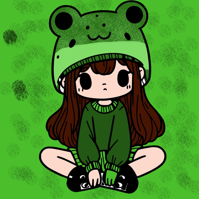a girl wearing a frog hat and some frog socks