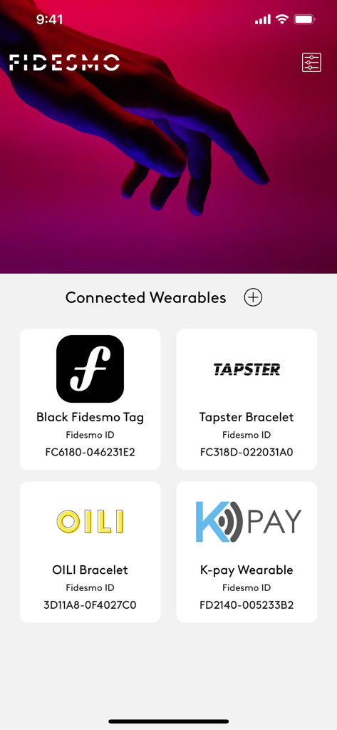 Interface of the Fidesmo app showing a list of connected contactless payment wearables like tags and bracelets