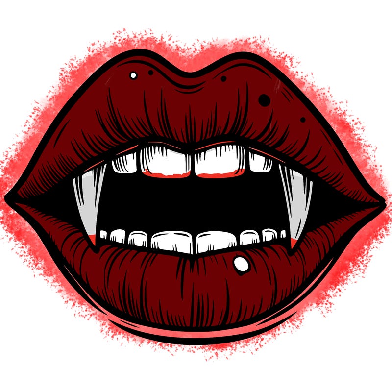 lips with vampire teeth