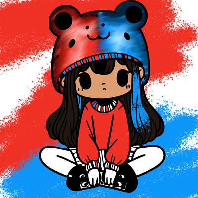 a girl wearing a frog hat and some frog socks