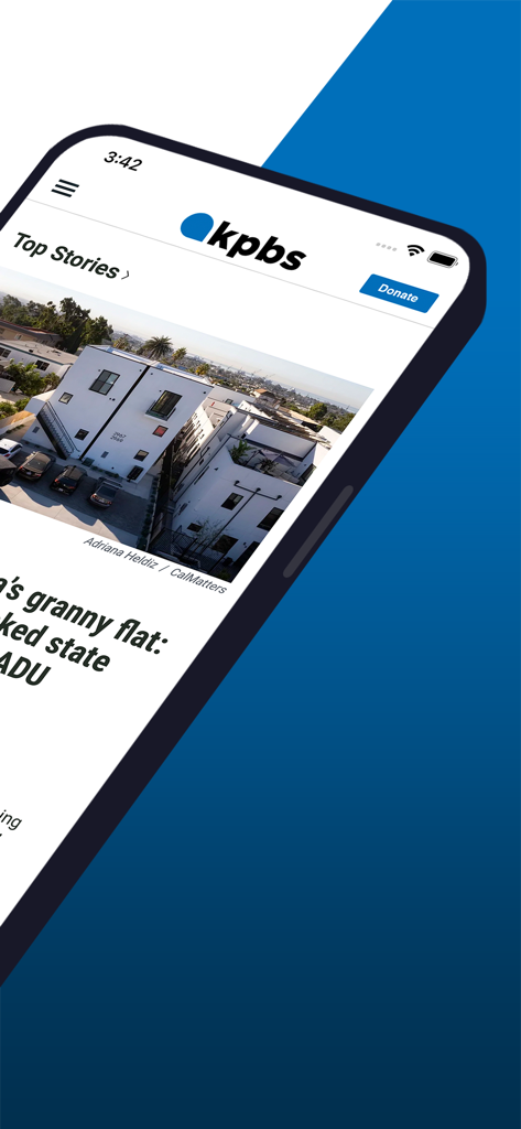 Smartphone screen showing the KPBS app interface with local San Diego news headlines.