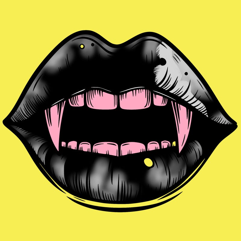 lips with vampire teeth