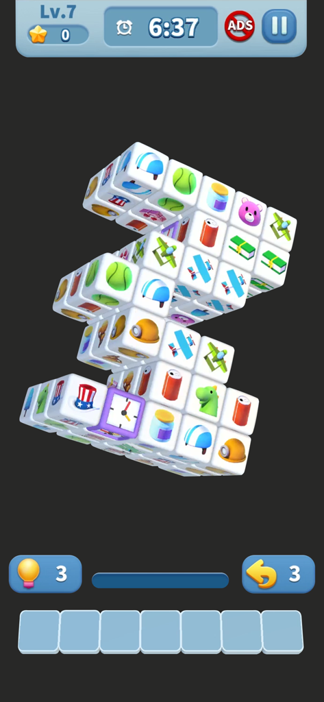 Gameplay screen of Cube Master 3D showing a 3D matching puzzle with colorful object tiles and a timer interface