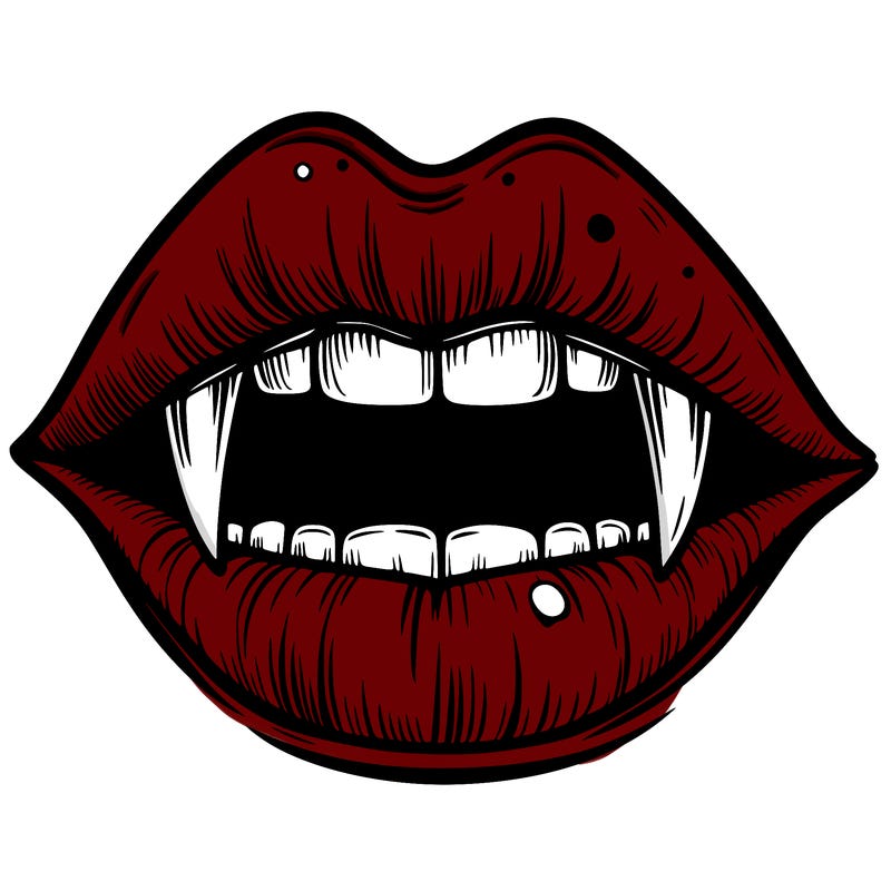 lips with vampire teeth