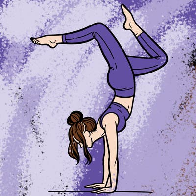 a woman doing a handstand