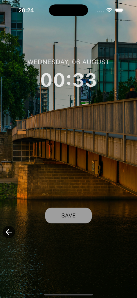 Urban Cityscape Wallpaper HD - Vista previa de un fondo de pantalla de paisaje urbano que presenta un puente sobre un río al anochecer en la pantalla de bloqueo de un iPhone.