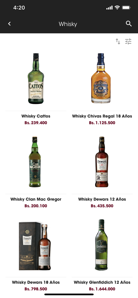 Mobile app interface of Licores Mundiales showing a catalog of premium whisky brands with prices