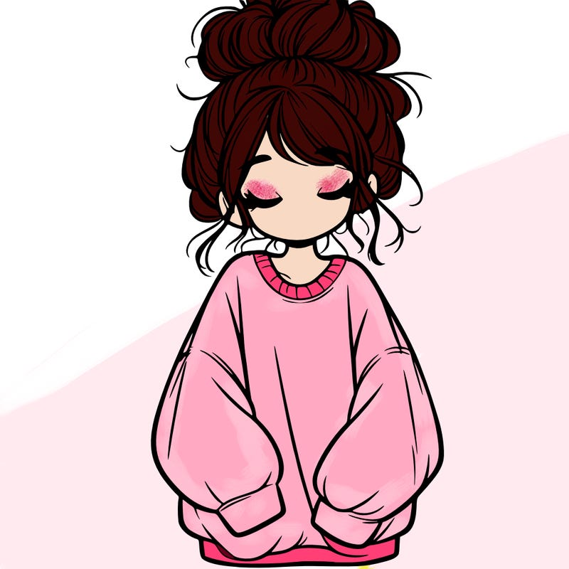 girl with baggy sweatshirt and messy bun