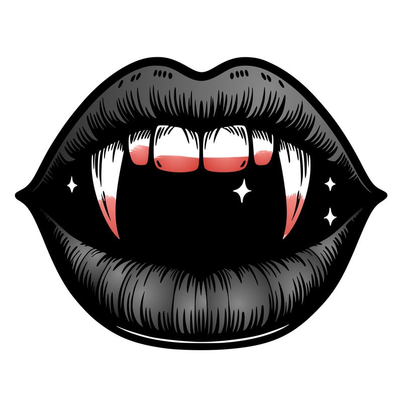 lips with vampire teeth