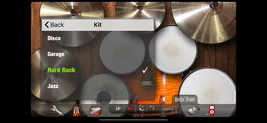 Rockin' Drums - Interfaz de la aplicación Rockin Drums mostrando el menú de selección de kits de batería con el estilo Hard Rock seleccionado.
