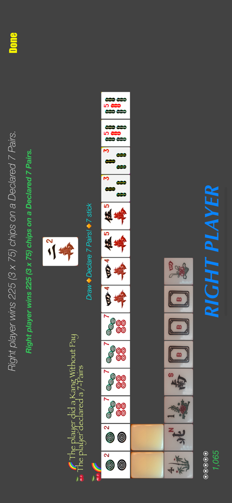 Screenshot di gioco di Pinoy Mahjong che mostra una vittoria dichiarata con sette coppie con tessere tradizionali