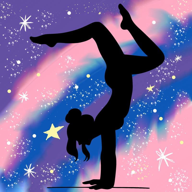 a woman doing a handstand