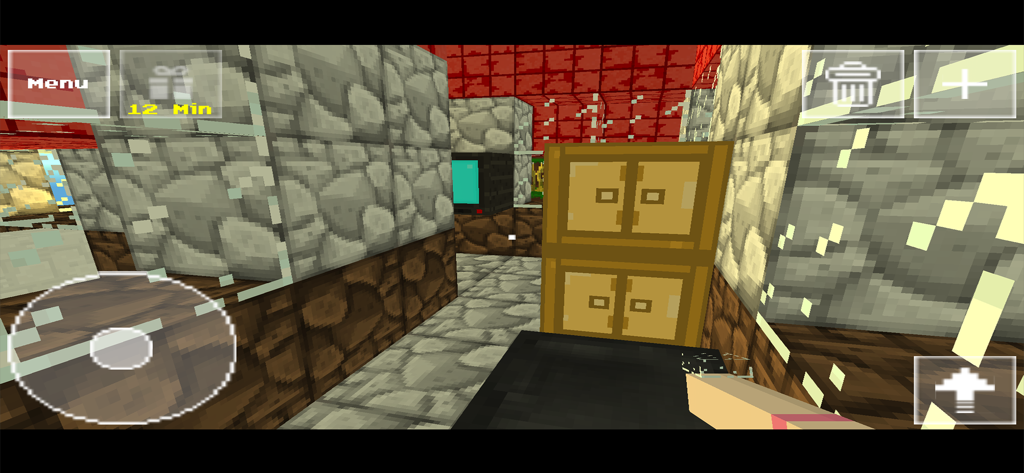 BoomCraft - A first person view of a room built with blocks in BoomCraft featuring a wooden chest and TV.