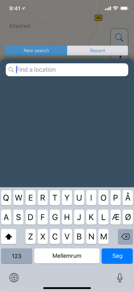 Interfaz de barra de búsqueda en la aplicación MHz para encontrar frecuencias de micrófono inalámbrico por ubicación