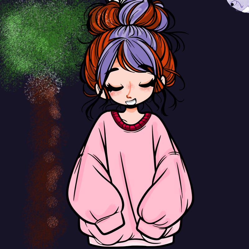 girl with baggy sweatshirt and messy bun