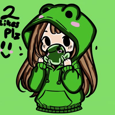 a girl holding a froggy hoodie