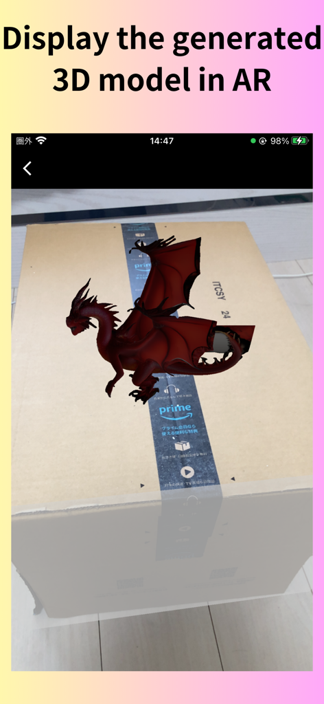 3D Maker：AI 3D Modeling, AR - Augmented reality view of a red 3D dragon model generated by AI on a physical box
