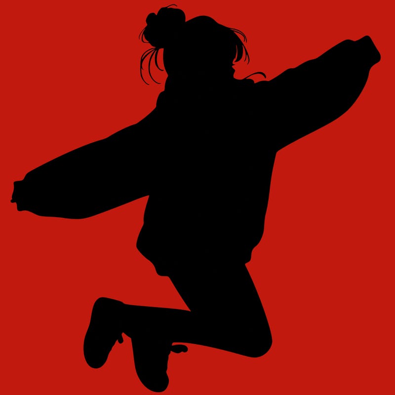 realistic girl jumping with a bun and oversized sweatshirt