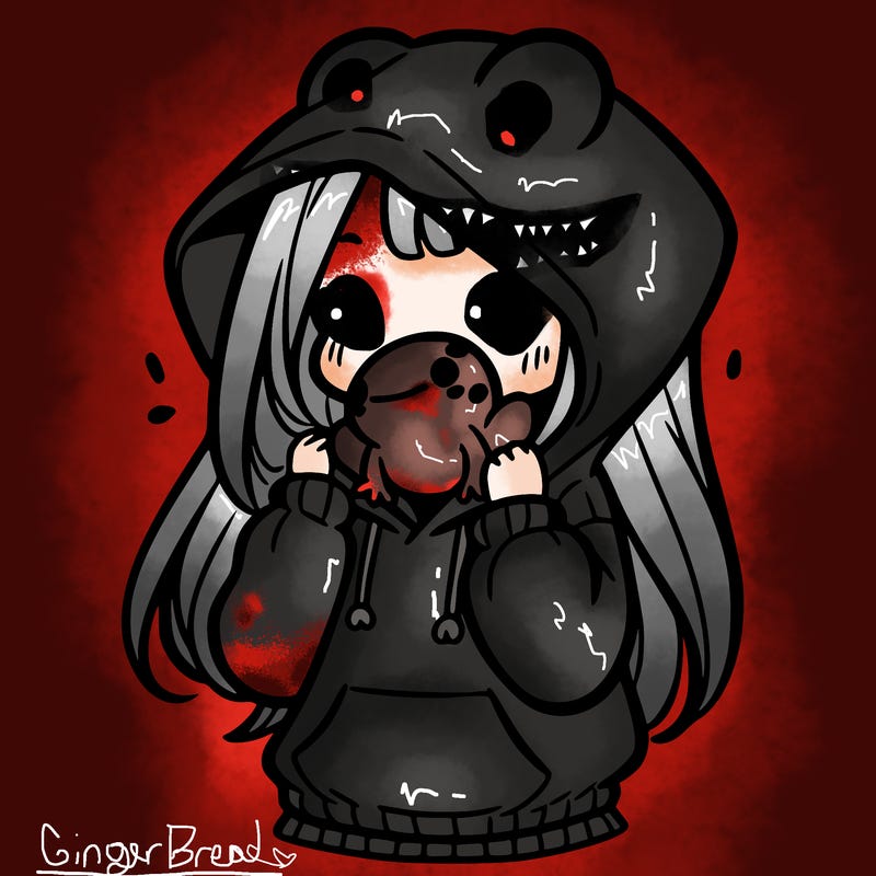 a girl holding a froggy hoodie